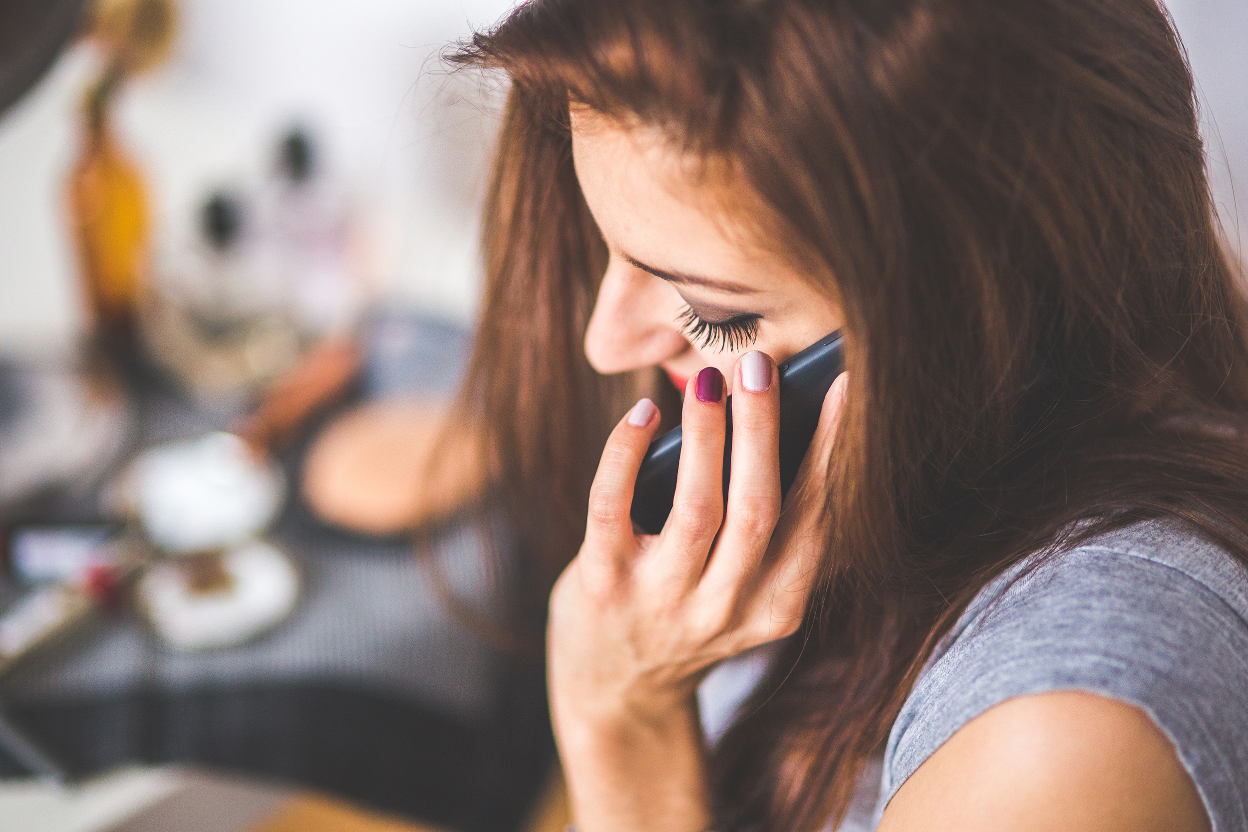 This image is of a woman talking on her cell phone. This image could depict someone who is needing online therapy in North Carolina. Get connected with an online therapist in North Carolina today! 28562 | 25015 | 27513