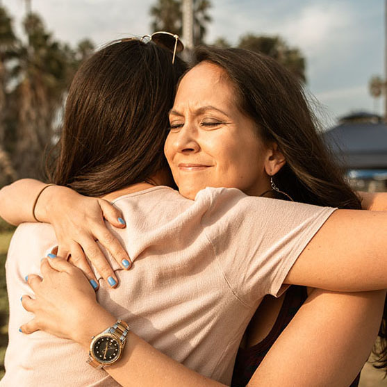 Woman hugging woman. This image could depict some people who need help with a behavior or substance addiction in North Carolina. Start with a substance use counselor in north Carolina to get support. 28401 | 28402 | 28403 