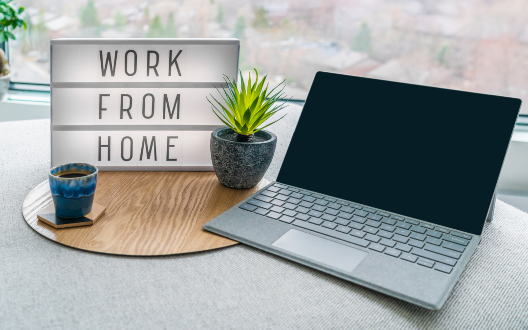 work from home sign and computer on a table. Online Counseling. 28562