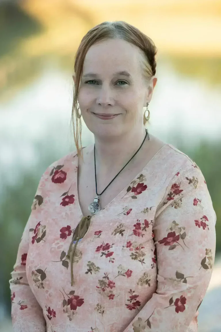Jessica Williford, LCSWA, smiling gently in a bright, welcoming space — a trauma-informed therapist who supports adults navigating anxiety, chronic illness, and relational challenges.