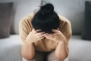 woman-experiencing-stress-anxiety-support-therapy-renewed-wellness